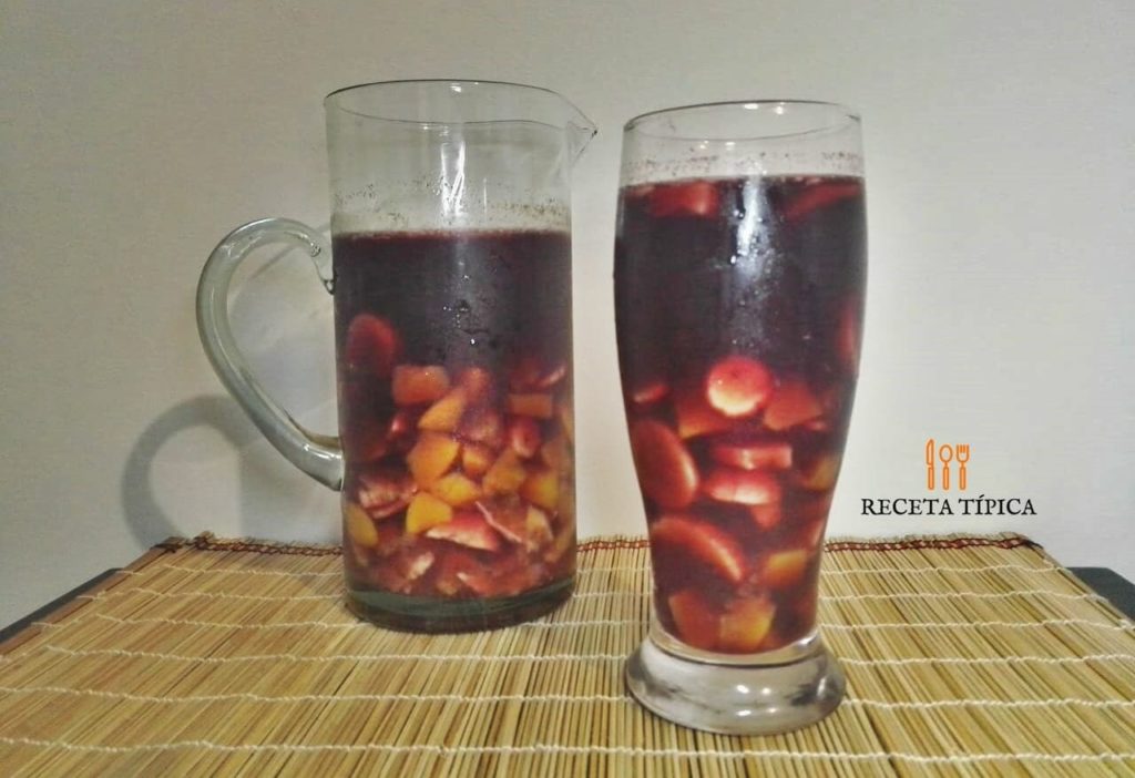 Glass and jar with sangria